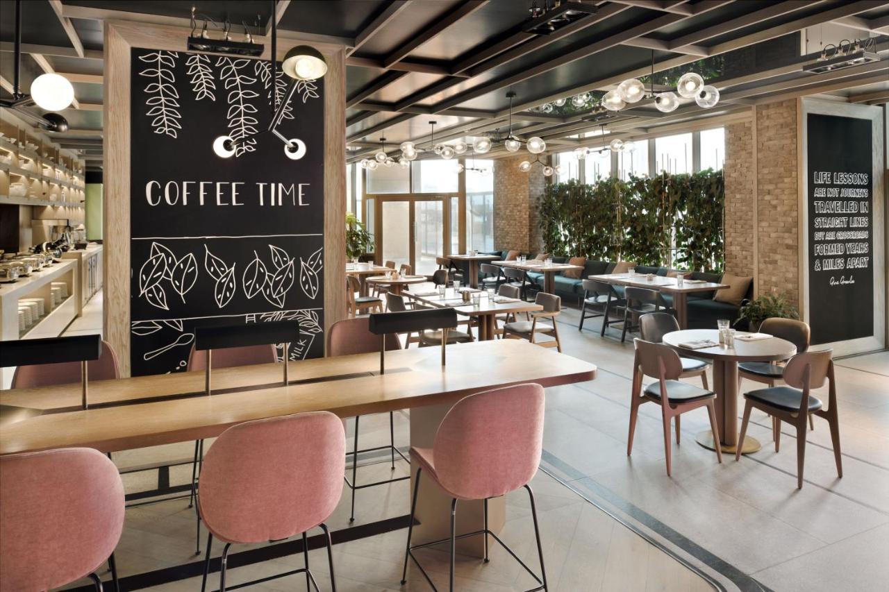 메리어트 이그제큐티브 아파트먼츠 마나마, 바레인 외부 사진 Interior of a coffee shop